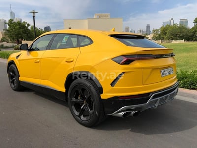 Yellow Lamborghini Urus for rent in Dubai 1