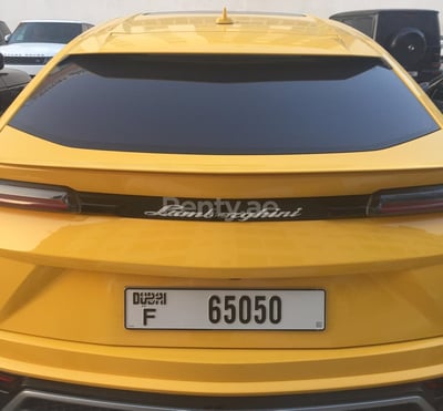 Yellow Lamborghini Urus for rent in Abu-Dhabi 1