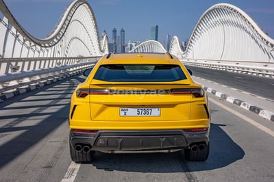 Yellow Lamborghini Urus for rent in Abu-Dhabi 1