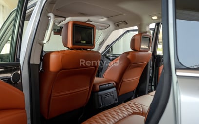 Beige Nissan Patrol V8 Platinum for rent in Dubai 2