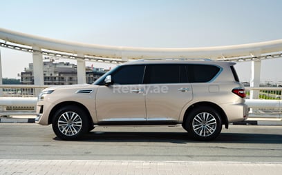 Beige Nissan Patrol V8 Platinum for rent in Dubai 4