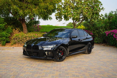 Black 2021 BMW 330i with M3 competition bodykit and upgraded exhaust system for rent in Sharjah 4