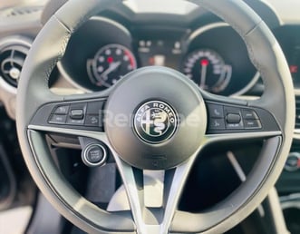Black Alfa Romeo Stelvio for rent in Dubai 1