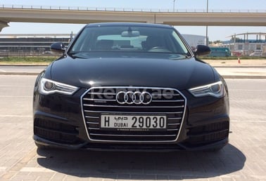 Черный Audi A6 2,8 quatrro в аренду в Abu-Dhabi 1