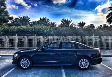 Black Audi A6 for rent in Abu-Dhabi 2