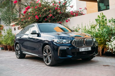 Black BMW X6 M50 for rent in Sharjah 1