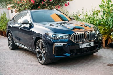 Black BMW X6 M50 for rent in Abu-Dhabi 2