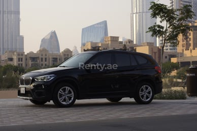 Black BMW X1 for rent in Abu-Dhabi 1