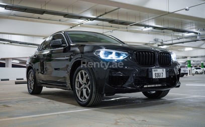 Black 2020 BMW X4 with X4M Body Kit for rent in Abu-Dhabi