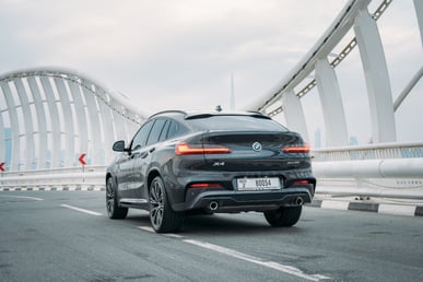 Black BMW X4 for rent in Dubai 3