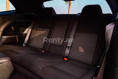 Orange Dodge Challenger for rent in Dubai 4