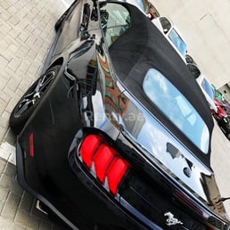 Black Ford Mustang Convertible for rent in Dubai 1