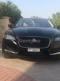 Black Jaguar XF for rent in Dubai 1