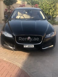 Black Jaguar XF for rent in Dubai 3