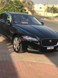 Black Jaguar XF for rent in Dubai 4