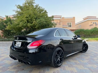 Black Mercedes C300 with C63 Black Edition Bodykit for rent in Sharjah 5