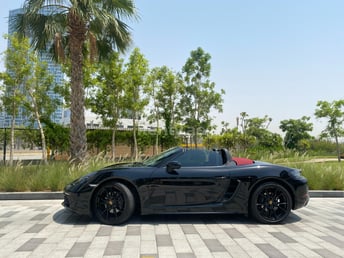 Black Porsche Boxster 718 for rent in Dubai 1