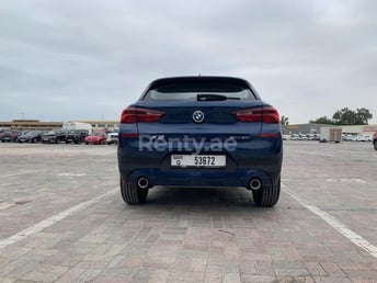 Blue BMW X2 for rent in Dubai 4