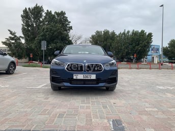Blue BMW X2 for rent in Dubai 6