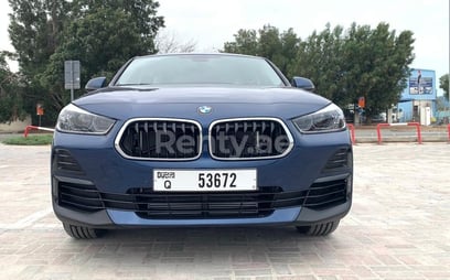 Blue BMW X2 for rent in Dubai