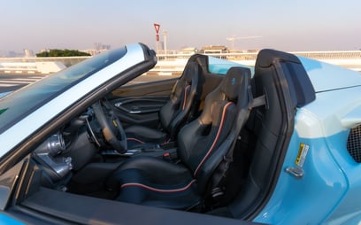 Blue Ferrari F8 Tributo Spyder for rent in Dubai 3