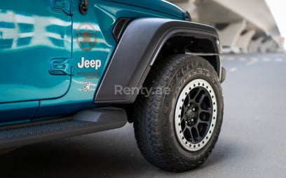 Blue Jeep Wrangler Limited Sport Edition convertible for rent in Dubai 2