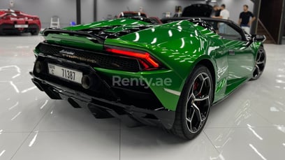 Green Lamborghini Evo Spyder for rent in Dubai 2
