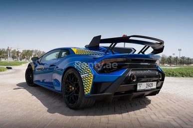 Blue Lamborghini Huracan STO for rent in Dubai 1