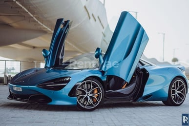 Blue McLaren 720 S Spyder for rent in Dubai 0