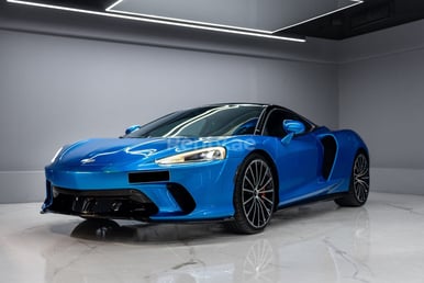 Blue Mclaren GT for rent in Dubai 1