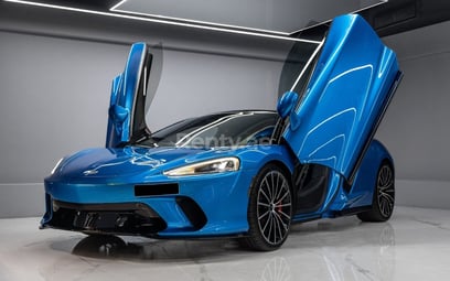 Blue Mclaren GT for rent in Dubai