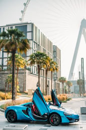 Blue McLaren 570S Spyder for rent in Dubai 7