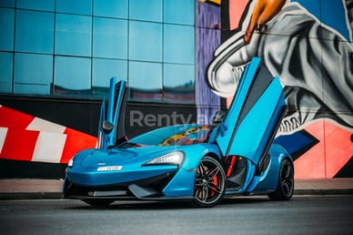 Blue McLaren 570S Spyder for rent in Sharjah 8