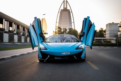 Blue McLaren 570S for rent in Sharjah 1