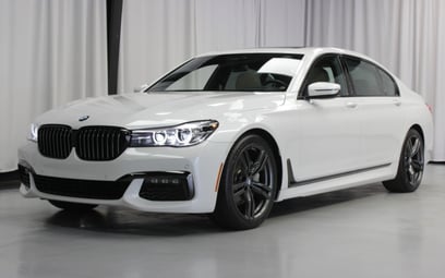 Bright White BMW 740 Li for rent in Sharjah