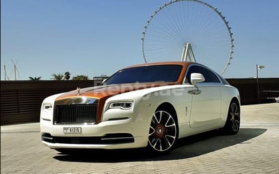 Gold Rolls Royce Wraith for rent in Sharjah