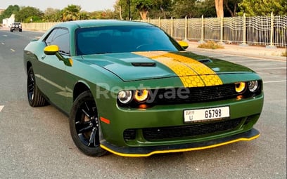 Green Dodge Challenger YG for rent in Dubai