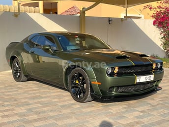 Green Dodge Challenger for rent in Dubai 1