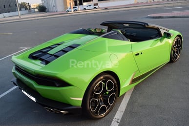 Green Lamborghini Huracan Spider for rent in Dubai 0