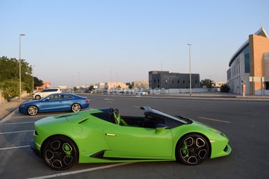 Green Lamborghini Huracan Spider for rent in Dubai 2