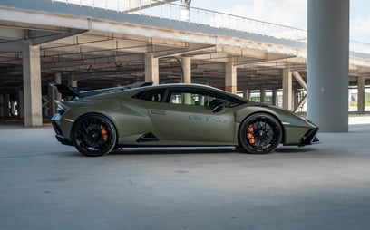 Green Lamborghini Huracan STO for rent in Dubai 1