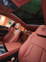 Green Lamborghini Urus for rent in Dubai 2