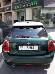 Green Mini Cooper for rent in Dubai 2