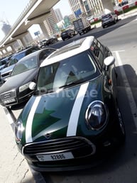 Green Mini Cooper for rent in Dubai 3