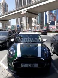 Green Mini Cooper for rent in Dubai 4