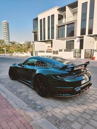 Green Porsche 911 Carrera Turbo S Top Car for rent in Abu-Dhabi 0