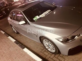 Grey BMW 3 Series for rent in Sharjah 2