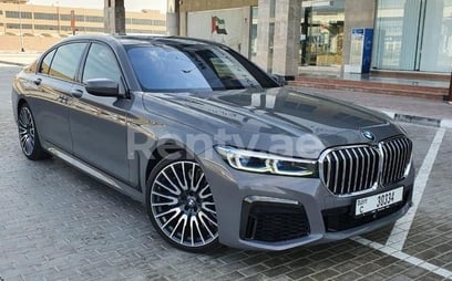 Grey BMW 750 Series for rent in Dubai