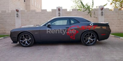 Grey Dodge Challenger V8 for rent in Dubai 1