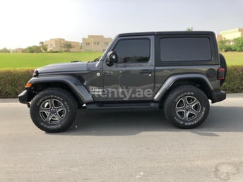 Grey Jeep Wrangler for rent in Dubai 1